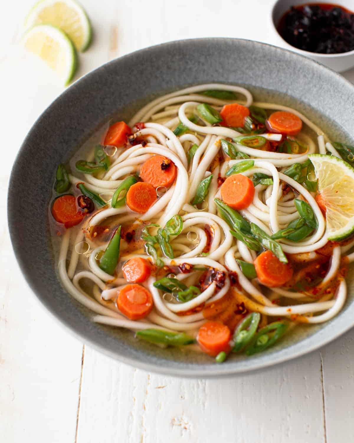 soup with noodles in a grey bowl