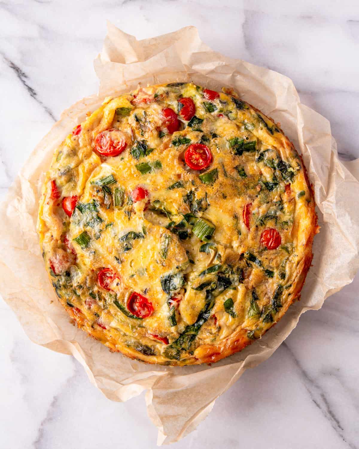 baked frittata on a marble countertop
