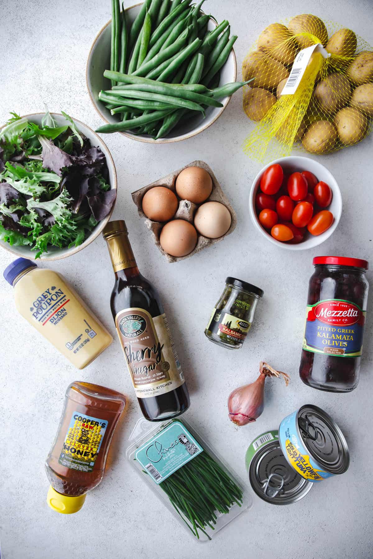 ingredients for salad on a grey countertop