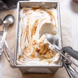 scooping ice cream out of a loaf pan