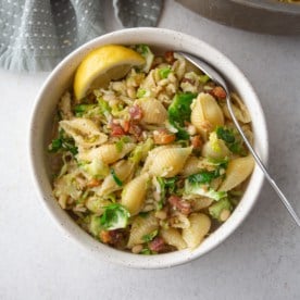 brussels sprouts pasta in a white bowl