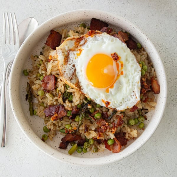 bacon fried rice in a white bowl