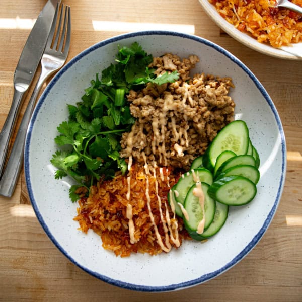 overhead image of chicken and rice bowl