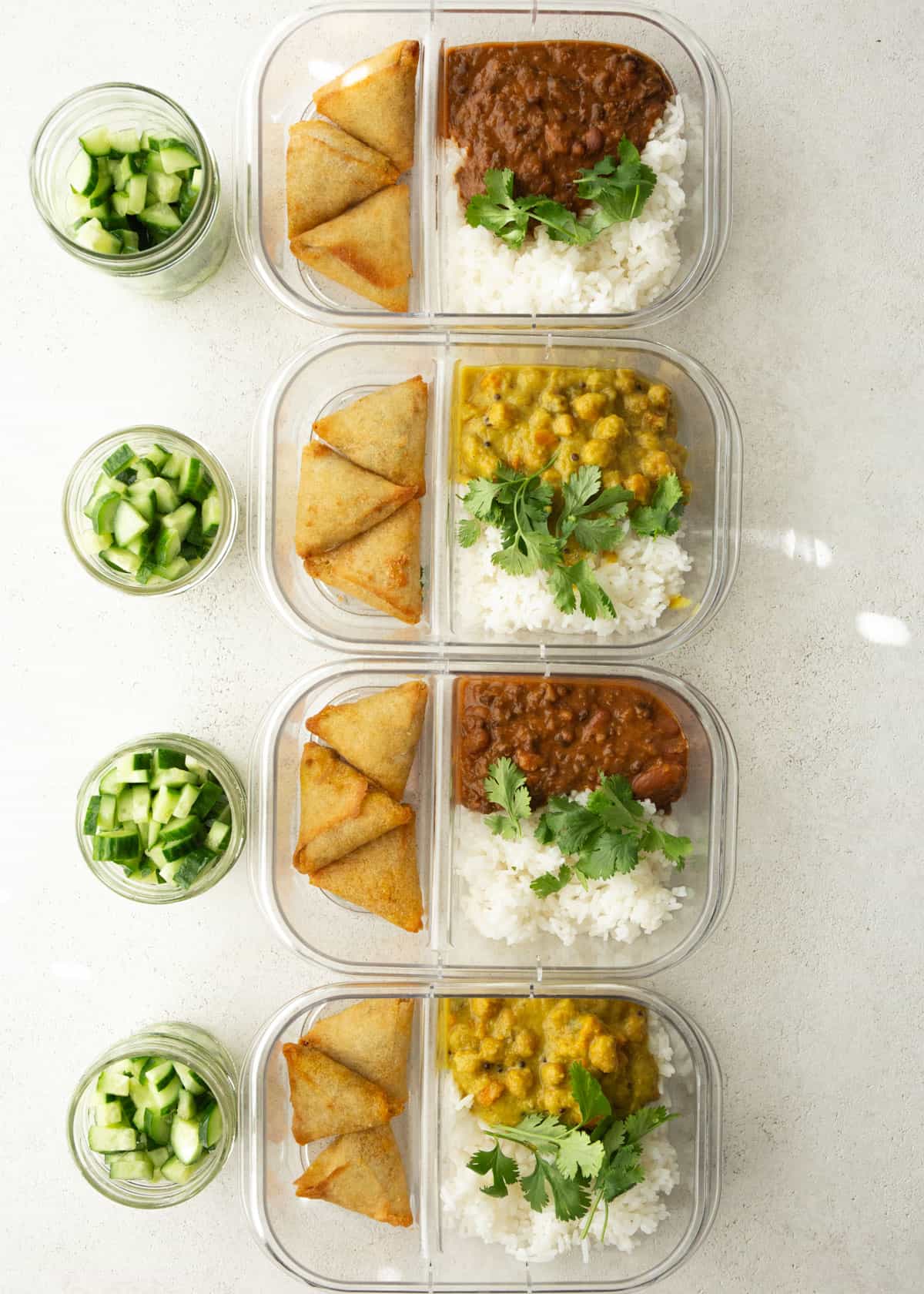 overhead image of curry in clear glass containers