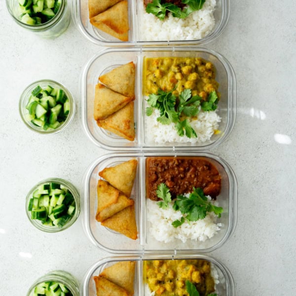 overhead image of curry in clear glass containers