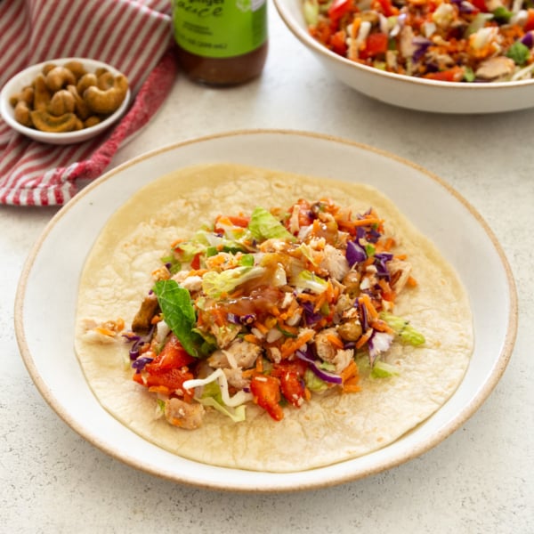 chopped chicken salad on a flour tortilla